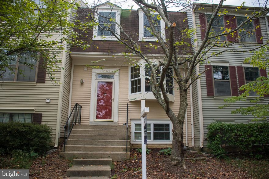 HUGE price drop!! Awesome location!! Hardwood floors run throughout this cozy townhome located right across from Centreville High School and close to all commuter routes and backing to woods! New, fresh paint, newer vinyl windows, 2-10 home warranty already in place! Enjoy morning coffee on the Trex deck. The basement is a walk out to the fully fenced, private backyard. Move in ready!