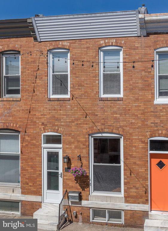 Love the City life? This 2 bedroom, 1.5 bath Patterson Park rowhouse could be the place that makes city living much more enjoyable. Located just walking distance to local entertainment and Patterson Park, this house features an open floorplan, hardwood floors, crown molding, recessed lighting, modern updates and exposed brick. Enjoy cooking in a beautiful kitchen complete with granite countertops and stainless steel appliances. End the day in a spacious master bedroom with walk-in closet. You also have the opportunity to turn the partially finished basement into your own little oasis.