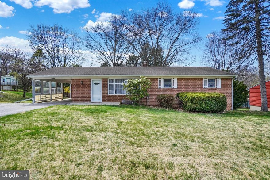 This charming ranch-style home, built in 1961, offers a perfect blend of comfort and functionality. With 3 bedrooms and 1.5 bathrooms, the traditional floor plan features inviting hardwood floors creating a warm atmosphere for gatherings. The first floor also offers a nice sized kitchen and dining room. The partially finished basement with a cozy fireplace, provides additional space for recreation or storage, with convenient walkout access to the expansive 0.28-acre lot, featuring a lovely front yard and spacious rear and side yards-ideal for outdoor activities or gardening. Located in a welcoming community, this home is close to local parks, schools, and essential public services, ensuring a vibrant lifestyle. Enjoy the convenience of an attached garage and carport, along with a paved driveway for easy access. This property is not just a house; it's a place to create lasting memories.