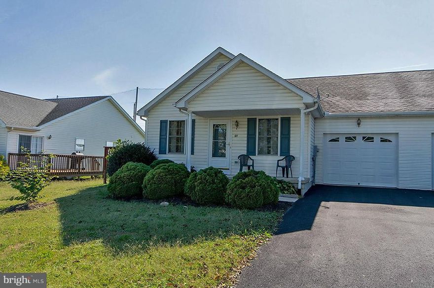 Like Brand New! Freshly painted & brand new flooring. Backs to open area, no one behind you!  Ready to move in with no sacrifices except stairs. Side deck with sliding glass doors, covered front porch and a one car garage with opener.  Conveniently located exit 8 near new Procter & Gamble site, Air Guard, I81 and minutes to Frederick, Virginia and Winchester. Affordable price + Home Warrnty!
