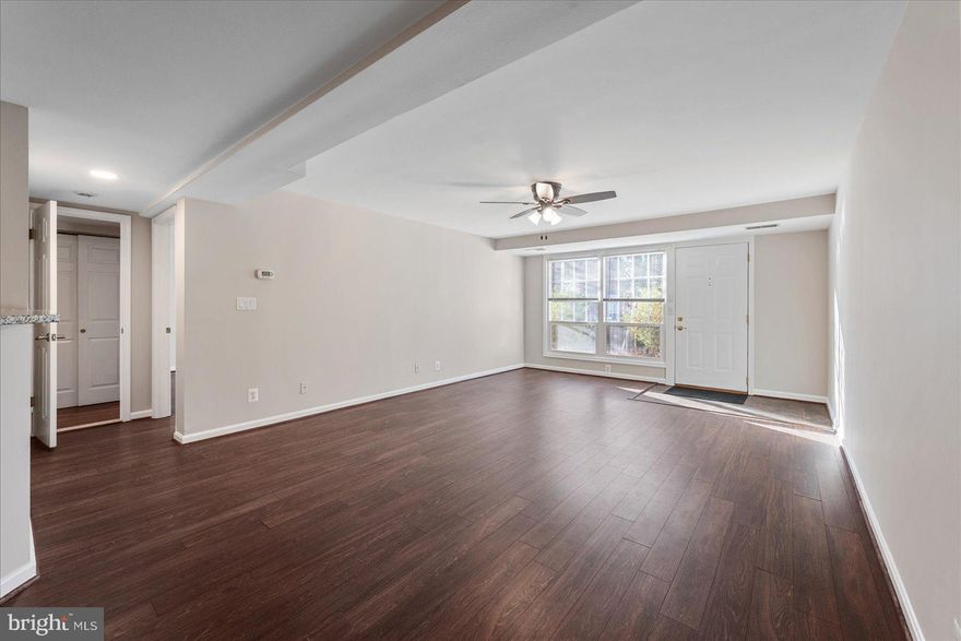 Open House Saturday the 17th from 2-4pm.  Big 1 Bedroom Patio Home. You will Love the Open Floor Plan with almost 1100 sq ft of Living Space. The Condo has Plank Flooring and was Recently Painted Throughout. The Kitchen Features Maple Cabinetry, Undermount Cabinet Lighting, Granite Countertops, and Gas Cooking.  Appliance Ages: Garbage Disposal (2025), Fridge (2021), Stove and Dishwasher (2019).  Laundry Room off Kitchen with Full Size Washer and Dryer.  Oversized Bedroom with Large Walk in Closet. The Bathroom was Newly Remodeled in 2025. Wonderful Patio Space that has been Freshly Power Washed.  Community Outdoor Pool, Fitness Center, and Clubhouse. Close to Major Routes & Metro.  Parking Passes for 2 Cars Available.  Pet Friendly Community.