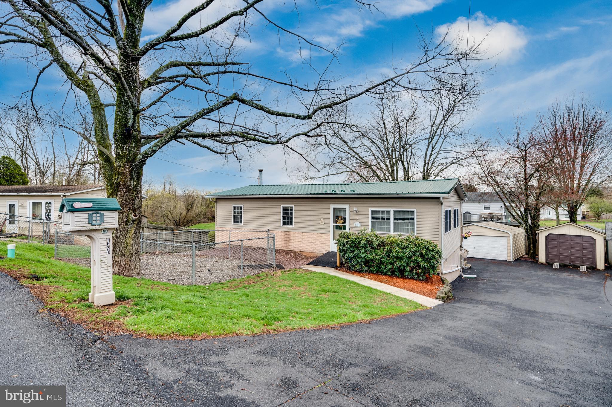 This property has a long driveway with one attached garage, and two detached garages for storage, or a potential workshop! The deck offers space for grilling, relaxing, or outdoor activities. Located in Exeter school district. Bring your offers!