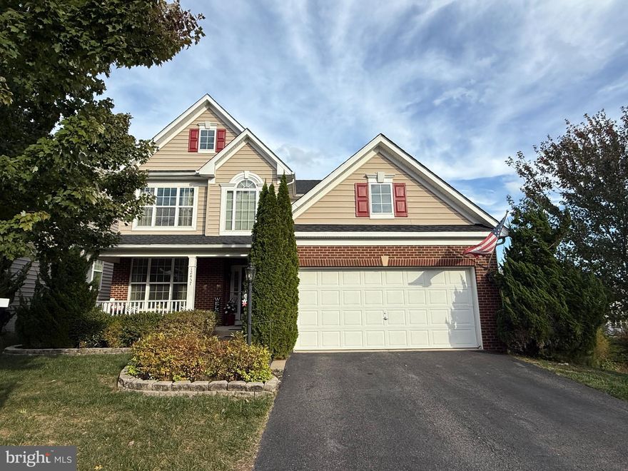 LOOKS LIKE A MODEL HOME!!!!  Colgan High School****6 bedrooms including one on main level***This stunning Woodbridge rental offers a beautifully open-concept layout and room for everyone with six spacious bedrooms and three and a half baths. On the main level, you'll find a versatile sixth bedroom or office space, perfect for working from home or hosting guests. The entire house features elegant hardwood floors paired with luxury vinyl plank, giving it a modern yet cozy feel. Step outside onto the large deck and enjoy a private setting with plenty of space for family activities. The walk-out basement is wide open, providing even more living and recreation options. The kitchen shines with granite countertops and a walk-in pantry, ideal for the home chef. Multiple walk-in closets and a huge mudroom add to the home's convenience. Residents will love the wonderful school district and the peaceful pond view. This home is available starting December 1st—apply directly on our company website to make it yours!  Great schools including Colgan High School.