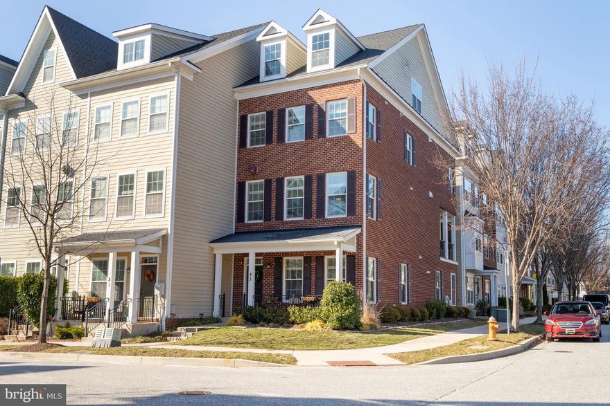 OPEN HOUSE CANCELED - UNDER CONTRACT. Welcome to 83 Linden Place, a rarely available luxury EOG townhome in the Towson Green Community. This stunning four-story home offers over 2,700 sq. ft. of beautifully designed living space. Bathed in natural light, this 4 BR / 3 full and 2 half bath home, the largest model in the community, features wood floors, soaring 9’ ceilings, elegant crown molding, recessed lighting, and more.  The kitchen is beautifully laid out and appointed with granite countertops, oversized cabinetry, an amazing butler's pantry, stainless steel appliances, and an adjoining dining room that leads to one of two private balconies. Upstairs, the owner’s suite is a retreat, complete with walk in closet, a dual vanity bathroom and a gorgeous tiled shower. Additionally located on this level are 2 more BRs, each with walk-in closets, another full bath, and the washer / dryer! The fourth floor is an absolute standout - generously sized, with a powder room, this loft level is currently set up for comfortable TV space and a game room. A wall of double doors opens to a fabulous and private rooftop deck—perfect for both entertaining and relaxing. The lower level includes a dedicated office/study or workout room, a third full bathroom, and your fourth bedroom with another walk-in closet! Parking is simple with a spacious two-car garage and ample street parking for guests. Towson Green’s HOA amenities include a private tot lot, a fenced dog park, and multiple community green spaces. Enjoy the Towson lifestyle, rich with history, and walkable to many vibrant shops, a luxury grocer, restaurants, and easy access to major commuter routes. A rare opportunity to own an exceptional home in an unbeatable location—don’t miss your chance to call Towson Green home!