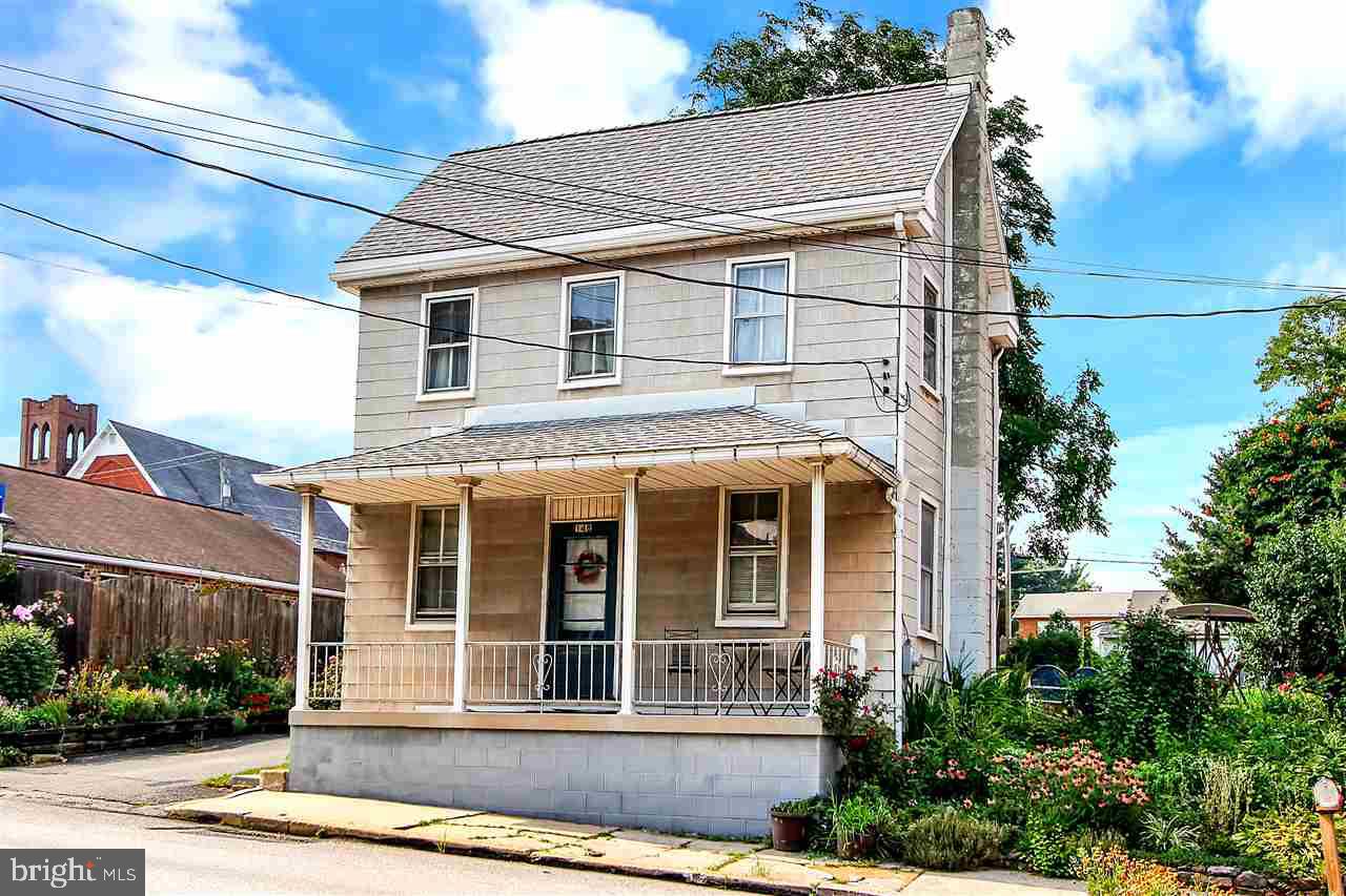 A NICE WELL KEPT COLONIAL HOME AT AN AFFORDABLE PRICE. HOME FEATURES A REMODELED KITCHEN AND BATHROOM, A FIRST FLOOR LAUNDRY ROOM, A COZY LIVING ROOM, SEPARATE DINING ROOM AND DEN. THE HOME HAS A FRONT PORCH, NEW CEMENT PATIO, A LARGE YARD, A GARAGE PLUS OFF STREET PARKING FOR 2 CARS.