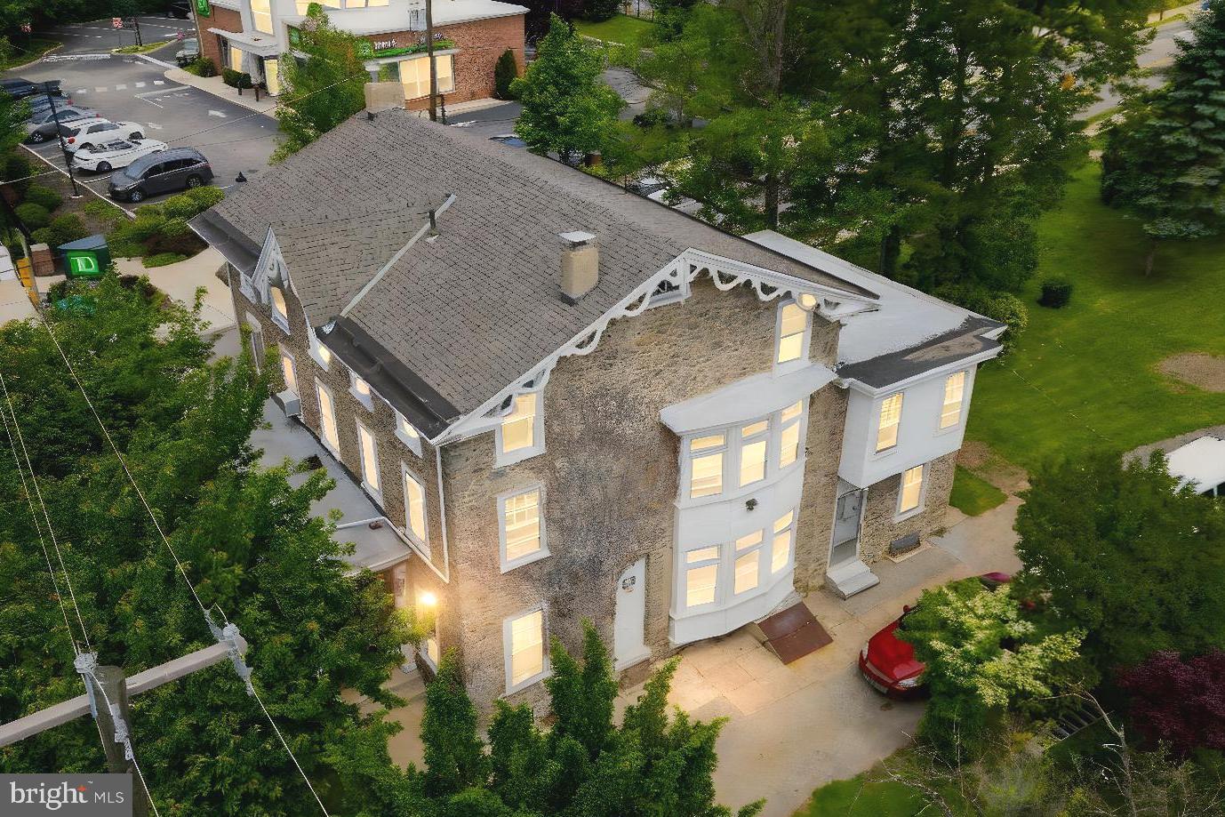 Dont miss out on this 28,000 squ ft lot with a charming stately home spanning approximately 5,800 squ ft. This grand charming home offers multiple potential uses which include a charming large single family home with a massive backyard for family gatherings or a 4 unit multi-family home to produce rental income or a duplex with a home office or even potentially sub dividing the lot with exciting redevelopment opportunities. With its historic charm and expansive lot you have the PERFECT opportunity to add your touch on a unique home in a high demand area of Roxborough and close to Wissahickon. Don't miss this opportunity.
The large front porch, framed by two stately columns, invites you inside, where the spacious front hallway leads to the first unit with a large family room, centered around a classic fireplace, perfect for cozy gatherings. The first floor unit boasts 3 generously sized bedrooms and a kitchen, awaiting your personal touches. Ascending up the stairs using the main hallway, you’ll find two additional units, each featuring large bedrooms, expansive living areas, and kitchens. The second unit has 2 bedrooms and the other has 1 bedroom. Going into the 3rd level of the home is another private unit complete with a 2 large bedrooms, eat-in kitchen, and inviting living space, offering flexible living options.
With its historic charm, expansive lot, and boundless potential, this gem is ready for restoration. Whether preserving its legacy or modernizing for today’s lifestyle, the opportunity is yours.
Don’t miss your chance to breathe new life into history—schedule a viewing today!
Buyer needs to do due diligence on zoning. Virtually renovated pictures are also included in the photo gallery.