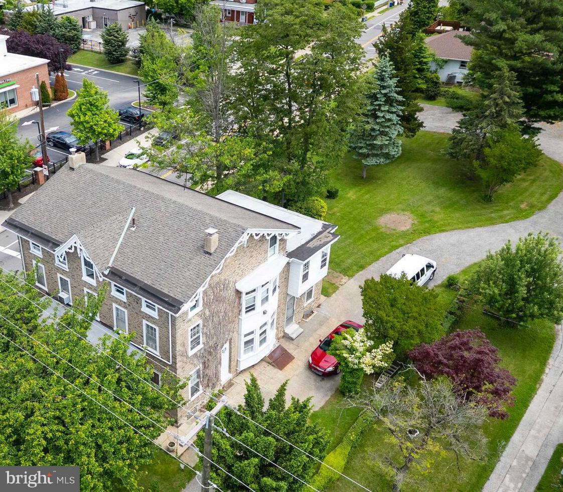Dont miss out on this 28,000 squ ft lot with a charming stately home spanning approximately 5,800 squ ft. This grand charming home offers multiple potential uses which include a charming large single family home with a massive backyard for family gatherings or a 4 unit multi-family home to produce rental income or a duplex with a home office or even potentially sub dividing the lot with exciting redevelopment opportunities. With its historic charm and expansive lot you have the PERFECT opportunity to add your touch on a unique home in a high demand area of Roxborough and close to Wissahickon. Don't miss this opportunity.
The large front porch, framed by two stately columns, invites you inside, where the spacious front hallway leads to the first unit with a large family room, centered around a classic fireplace, perfect for cozy gatherings. The first floor unit boasts 3 generously sized bedrooms and a kitchen, awaiting your personal touches. Ascending up the stairs using the main hallway, you’ll find two additional units, each featuring large bedrooms, expansive living areas, and kitchens. The second unit has 2 bedrooms and the other has 1 bedroom. Going into the 3rd level of the home is another private unit complete with a 2 large bedrooms, eat-in kitchen, and inviting living space, offering flexible living options.
With its historic charm, expansive lot, and boundless potential, this gem is ready for restoration. Whether preserving its legacy or modernizing for today’s lifestyle, the opportunity is yours.
Don’t miss your chance to breathe new life into history—schedule a viewing today!
Buyer needs to do due diligence on zoning. Virtually renovated pictures are also included in the photo gallery.