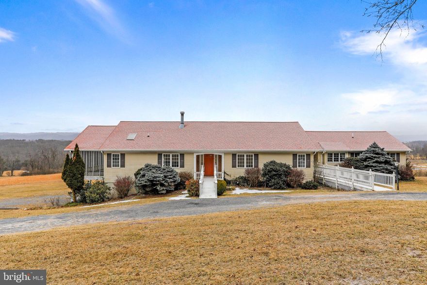 Set amidst the tranquil scenery of Hampshire County, West Virginia, this captivating property offers a picturesque escape from the demands of city life. Boasting a spacious 4-bedroom, 3-full bathroom home, the residence spans over 3,000 sq. ft., creating a comforting and hospitable sanctuary for family and friends. The flexible layout includes a second kitchen, allowing for the creation of an in-law suite or additional living space, and an unfinished basement with a 2-car garage for added convenience. Situated on 30 acres of pristine land, the property showcases the best of both worlds with towering hardwoods and scenic meadows. Whether you're an outdoor enthusiast or simply seeking a tranquil setting, this property offers a myriad of recreational opportunities right at your doorstep. Enjoy the thrill of great hunting or unwind by the peaceful pond, complete with a charming gazebo – the perfect spot for relaxation or fishing. Escape the hustle and bustle of Northern Virginia, Maryland, or Washington DC, and embrace the tranquility of rural living. This property is not just a home; it's a haven where you can experience the beauty of nature while enjoying the comforts of a thoughtfully designed residence. Seize the opportunity to make this rural retreat your own – come see for yourself why Hampshire County, West Virginia, is the ultimate rural destination west of the beltway.