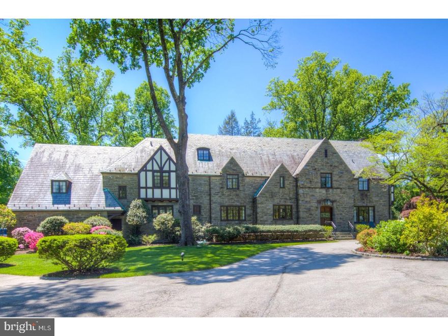 Welcome to 48 Tunbridge Rd, an exquisitely renovated 1930's Grand Manor Tudor set in the estate section of Haverford. This elegant home carefully blends the stunning architectural features, millwork and craftsmanship of a by-gone era with beautiful updates and refinements to suit the most discerning buyer. This stunning residence is set on over 2 park-like acres and includes a flagstone patio, pool, spa and pool house. The home features over 8,000 sq. ft. with 7 bedrooms, 5 full and 3 half baths. Enter through a spacious foyer with powder room into a gracious living room with gas fireplace, wide-planked oak floors and built-ins. This leads into a family room with a wall of windows and an entertainment center with wet bar. A library with custom wood panels leads to a formal dining room and then onto the cook's kitchen, complete with butler's pantry, granite countertops and island, commercial grade stainless steel appliances, new utility closet and new walk-in pantry. A charming breakfast room sits off the kitchen and leads to the new Breezeway addition with a new powder room, laundry room, mudroom with cubbies and outside entrance,entrance to the garage and stairs to the basement.  The Master suite is a private oasis, complete with wood-burning fireplace, vaulted ceiling,decorative Juliet balcony, sitting room, dressing room and a new master bath with marble countertops, shower and floor. Bedrooms #2 and #3 are a Jack and Jill with a shared updated bath, Bedroom #4 is en suite. The second floor is completed with a private area off the back stairs that has 2 bedrooms and a bath ? perfect for a nanny or in-law suite. The third floor has an additional bedroom and new bath, cedar closet and large floored attic. The completely renovated basement contains a temperature and humidity controlled library and new powder room for the avid reader. A perfect home for the most discriminating buyer who enjoys classic elegance with amenities for today's lifestyle.