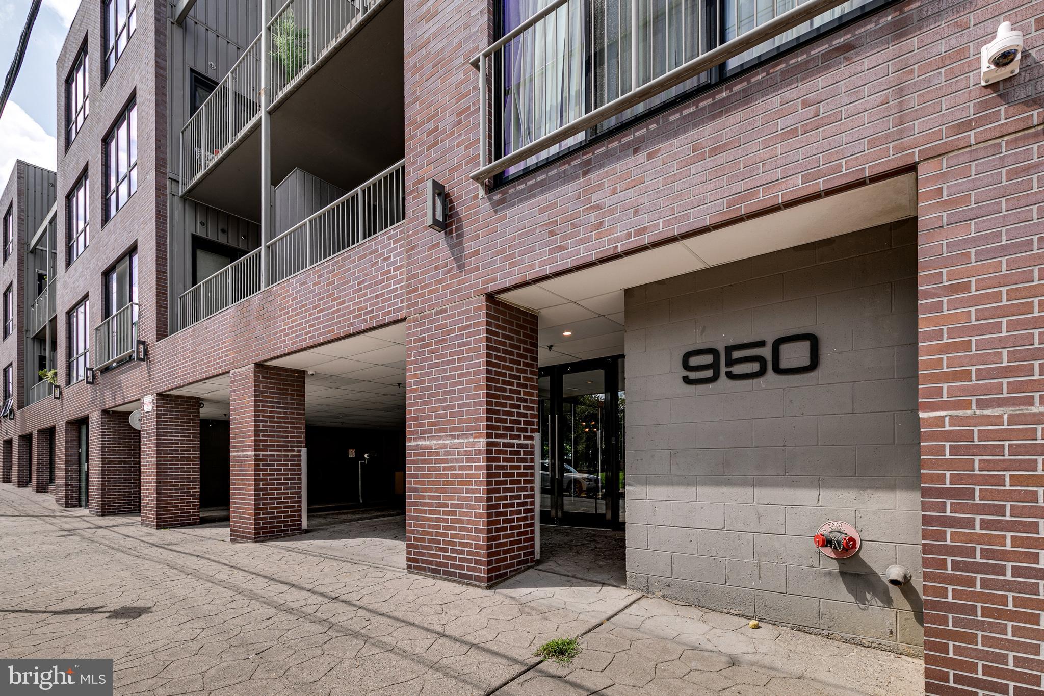A modern, luxury condo in a vibrant, walkable neighborhood – 950 N 3rd St #407 is the best of city living! This 1 bed, 1 bath home, located in booming Northern Liberties, offers secure parking, a private balcony, and a shared patio. The interior of this unit features a highly functional layout with a huge living room and dining area filled with natural light from floor to ceiling windows. This open space has room for a work-from-home set-up, at-home workouts, and entertaining guests. From the living room, you can access the secluded private balcony overlooking the lush trees that border the rear of the building. This peaceful oasis is the ideal spot to enjoy a morning cup of coffee or an evening glass of wine. Back inside, hardwood floors and recessed lighting extend throughout the unit including the sleek galley-style kitchen fitted with custom flat-front cabinetry, black granite countertops, Bosch stainless steel appliances, and a breakfast bar with seating for 3+. A hall off the foyer leads to the in-unit laundry closet and the large full bathroom. Completing the home is a generous-sized bedroom with tons of natural light and a walk-in closet. In addition to all that's offered inside of 950 N 3rd St #407, its spectacular Northern Liberties location is a walker’s paradise with a Walk Score of 98! All the dining, entertainment, and essential shops you’ll want and need are just a few blocks away. There are lots to explore on nearby 2nd street including North Bowl, Once Worn consignment shop, STUMP garden center, Genesis Nail Salon, and GIANT Heirloom Market. Also on 2nd St is the 80,000 square-foot, open-air Piazza at Schmidt’s which hosts free festivals, concerts, events, and storefronts like Orangetheory Fitness, Urban Village Brewing Company, and Creep Records. Just off the Piazza, there are dining options from all over the world along Liberties Walk including Thai at Baan Thai Thai, Japanese at Hikari Sushi, Mediterranean at Apricot Stone, and Tex-Mex at El Camino Real. Brunch favorites Cafe La Maude, Honey’s Sit ’n Eat, and North Third are a block south of the building plus picturesque Liberty Lands park & community garden and Orianna Hill Dog Run is on the same block! This location also provides easy access to I-95, I-676, and South Jersey. Schedule your in-person or virtual tour today!