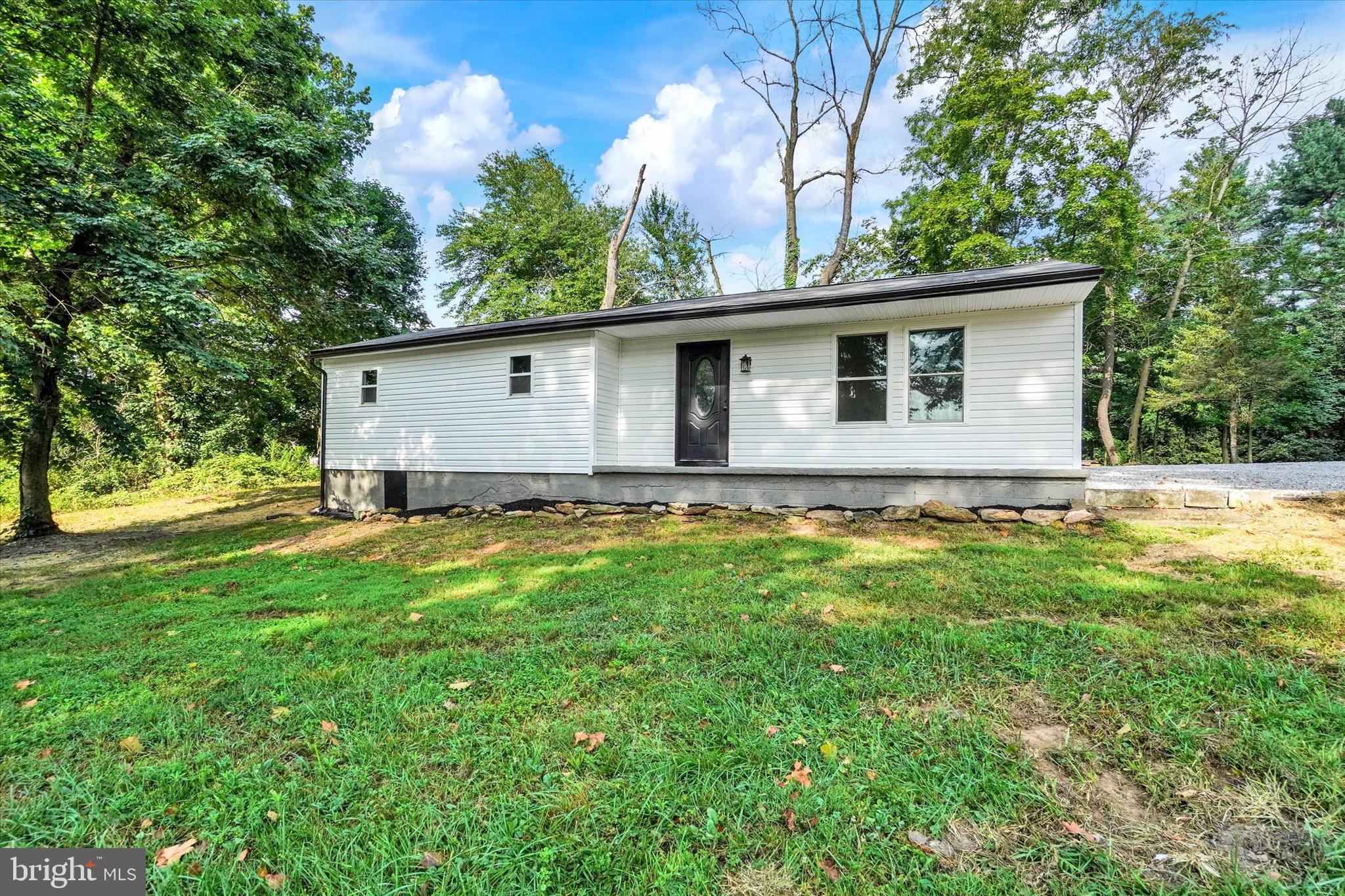 Welcome to this beautifully updated 3-bedroom, 1-bath rancher, set on a spacious .66-acre lot in the Northeastern School District. This home has been tastefully remodeled throughout, offering move in ready comfort with modern style. Step inside to find an inviting main level featuring fresh flooring, updated lighting, and a neutral color palette. The remodeled kitchen boasts new cabinetry, countertops, and stainless steel appliances, while the renovated bathroom offers a clean, contemporary design. Three comfortable bedrooms provide plenty of space for rest and relaxation. Enjoy outdoor living on the expansive lot, perfect for gardening, entertaining, or simply unwinding in a peaceful setting. With single-level living, modern updates, and a prime location close to schools, parks, and major commuter routes, this property is the perfect blend of convenience and charm.