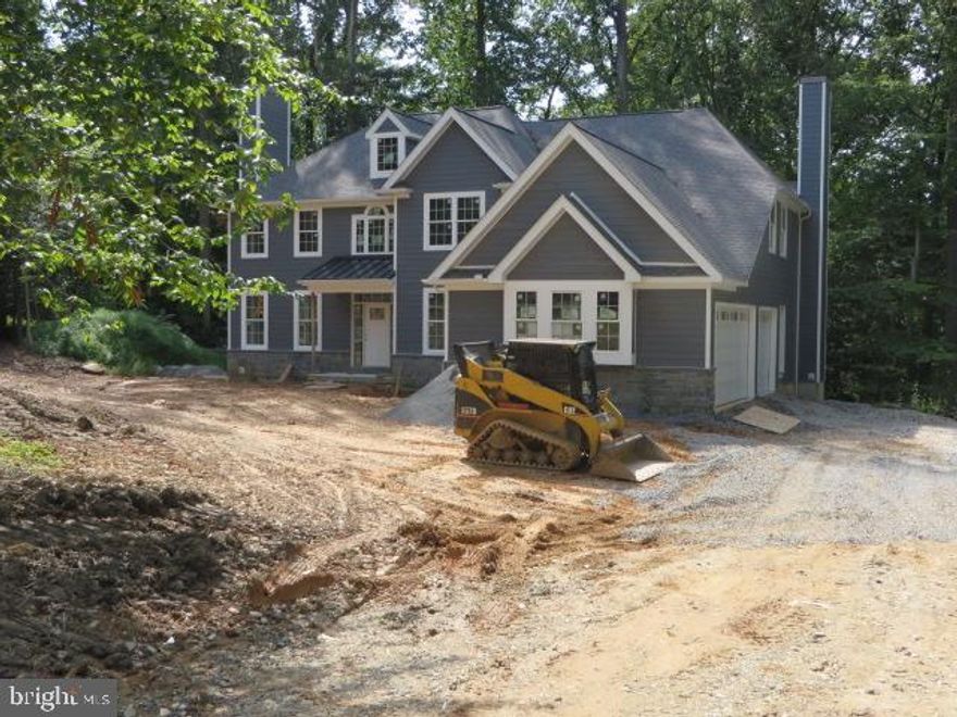 Almost three-quarters of an acre! Amazing setting, situated across from the Jenkins Arboretum! In an Award-winning School District. Built by Award-winning D'Agostino Builders.  The floor plan has great flow and positive Feng Shui.  The study is located where there's ultimate privacy, the open and functional kitchen is equipped with a double oven, stainless steel appliances, granite countertops and island. Site finished hardwood flooring in foyer, dining room, kitchen, breakfast room and formal powder room. There are two fireplaces, front and back staircase and much, much more! Experience the difference! Make sure you go to Documents to review the floor plan, plot plan and specifications, listing the included amenities.