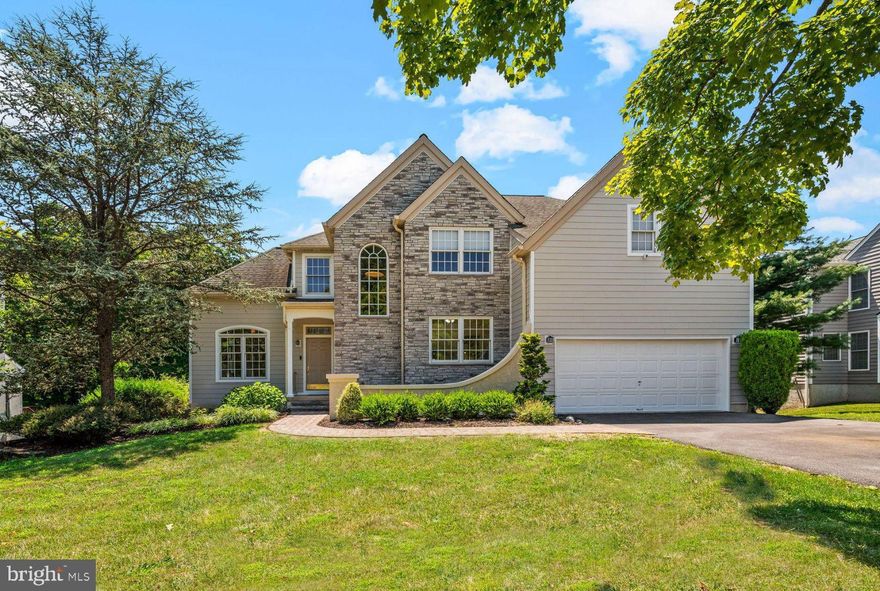 Welcome to 694 Cherrydale Drive, a lovingly maintained and updated home situated on a beautiful tree lined street in The Reserve neighborhood of Lafayette Hill. As you enter, you are greeted by a grand two-story foyer and a living room, perfect for entertaining guests. Adjacent is the stunning dining room adorned with vaulted ceilings, offering an elegant setting for formal occasions. The private office is surrounded by windows that flood the space with natural light and enjoy direct access to the rear deck, ideal for those seeking a tranquil home work environment. The heart of the home is the eat-in kitchen, a home cook’s delight featuring stainless steel appliances including a 5-burner stove, double ovens and built-in microwave. A large window overlooks the backyard, while a peninsula with bar seating and breakfast area with built in banquette seating enhances the everyday family dining experience. The kitchen seamlessly opens into the family room, highlighted by a beautiful coffered ceiling and exposed brick surrounding the brand-new gas fireplace. Sliding glass doors lead to a rear deck enveloped by mature trees, offering privacy and a perfect setting for outdoor gatherings. Additional highlights on the first floor include an updated half bath, convenient first-floor laundry room, and direct access to the 2-car garage. Upstairs, the expansive primary suite awaits, boasting coved ceilings, a large walk-in closet, and an ensuite bathroom featuring a dual vanity, a walk-in shower, and a separate soaking tub for ultimate relaxation. Three secondary bedrooms provide versatility, two of which include built-in desks and platform beds with storage solutions, while the third offers a walk-in closet for added convenience. A hall bathroom with a double vanity completes this level. The walk-out basement offers additional living space and entertainment options. Glass French doors lead to two distinct entertaining areas featuring a gas fireplace surrounded by built-ins and access to the back patio. Fitness enthusiasts will appreciate the dedicated gym space with padded flooring, while a small room offers flexibility as an auxiliary bedroom or office to suit your needs. A full bathroom rounds out the basement level, ensuring convenience for family and guests. Outside, the property is beautifully landscaped; Mature trees and well-maintained greenery offer privacy and a serene backdrop for outdoor activities. Conveniently located just minutes from parks, shopping, and dining options in Chestnut Hill this home combines luxury living with everyday convenience. Don't miss the opportunity to make this exceptional property your new home. Schedule your  showing today and envision the possibilities awaiting you at 694 Cherrydale Drive.