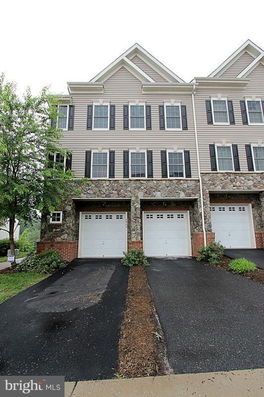 Nothing left to do in this charming,maintained  townhouse style condo.This home is ideally located near I-95, shopping, schools, parks and more.  Features 3 levels, hardwood floors, granite counters, stainless steel appliances, master bedroom suite with tray ceiling, large mbath with double vanity, separate shower & garden tub, walk-in closet, 1 car garage, end unit, community has pool & center.