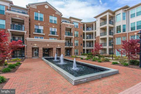 Photo of 2907 Saintsbury Plaza #404, FAIRFAX, VA 22031 (MLS # VAFX2328598)