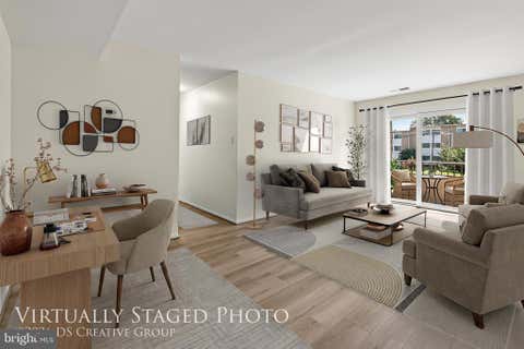Photo of 503 Florida Avenue #104, HERNDON, VA 20170 (MLS # VAFX2334154)
