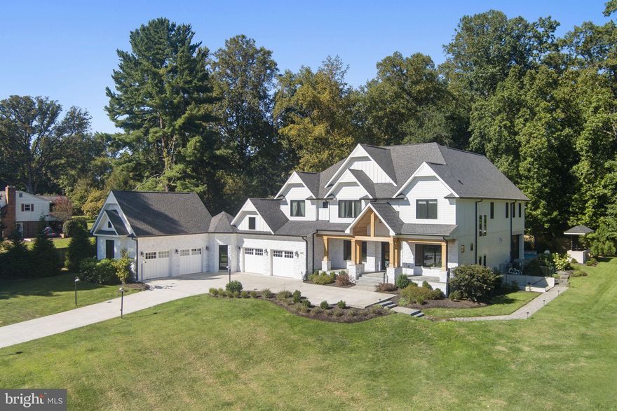 Welcome to 608 Walker Road, an exceptional estate in the heart of Great Falls, where refined architecture and thoughtful ownership come together to create a residence of lasting quality. Completed in 2021 and enhanced through a series of deliberate, high-level upgrades, the home reflects a clear focus on privacy, performance, and long-term livability.

Set behind a newly constructed perimeter fence and custom gate, the approach establishes both presence and security, while the freshly poured concrete driveway introduces a clean, expansive arrival experience. Designed with both function and foresight, subtle grading and detailing at the entry ensure a seamless enclosure, reinforcing the property’s sense of privacy without compromising aesthetic continuity.

Inside, the home unfolds with scale and clarity. Soaring ceilings, curated finishes, and a fluid layout define the main level, anchored by a chef’s kitchen with premium appliances, custom cabinetry, and a statement waterfall island. Formal and informal spaces are thoughtfully balanced, creating an environment equally suited for entertaining and everyday living.

Upstairs, the primary suite serves as a private retreat, offering a sitting area, expansive walk-in closets, and a spa-caliber bath designed with both comfort and proportion in mind.

The lower level has been fully realized as a destination within the home. A dedicated theater with custom seating, a fully equipped gym featuring premium Rogue Fitness installations, and additional recreation spaces create a layered lifestyle experience that extends well beyond the expected.

Outdoors, the property transitions into a resort-style setting. A saltwater pool anchors the rear grounds, supported by consistent professional maintenance and complemented by a winter cover, integrated storage, and thoughtful accessory inclusions. Covered patios and an outdoor fireplace extend usability across seasons, while a dedicated garden area introduces an element of lifestyle flexibility.

Behind the scenes, the infrastructure of the home has been equally prioritized. A whole-house generator by Kohler, still under warranty, provides uninterrupted power across all systems. The garage has been upgraded with a professional-grade finished surface, built-in cabinetry, and wall storage, reinforcing both utility and presentation. HVAC enhancements have been implemented to improve air quality and circulation, while ongoing septic and exterior wood maintenance reflect a consistent standard of care.

Throughout, the current ownership has approached the property with a focus on preservation and enhancement, investing meaningfully in both visible and behind-the-scenes improvements. The result is a home that not only presents at a high level, but performs at one as well.

Positioned minutes from Great Falls Village, parks, and key commuter routes, 608 Walker Road represents a complete offering. A residence where design, execution, and stewardship align to deliver a property of lasting value.