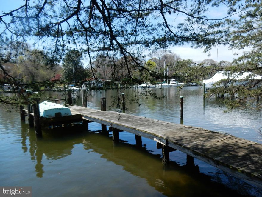 Spectacular Opportunity in Severna Park!  Gorgeous Water Front Lot.  Wooded, Yet Expansive Views of Cypress Creek with private dock.  Bring your power or sail boat.  Secluded Feel.  The prefect location to build your Dream Home. Cape Arthur Nbrhd  no HOA.  A few skipping stones to the Magothy River. Value in Land. Easy commute to Annap, Balto & D.C.  Walk to shopping restaurants, bank,Bike Trail