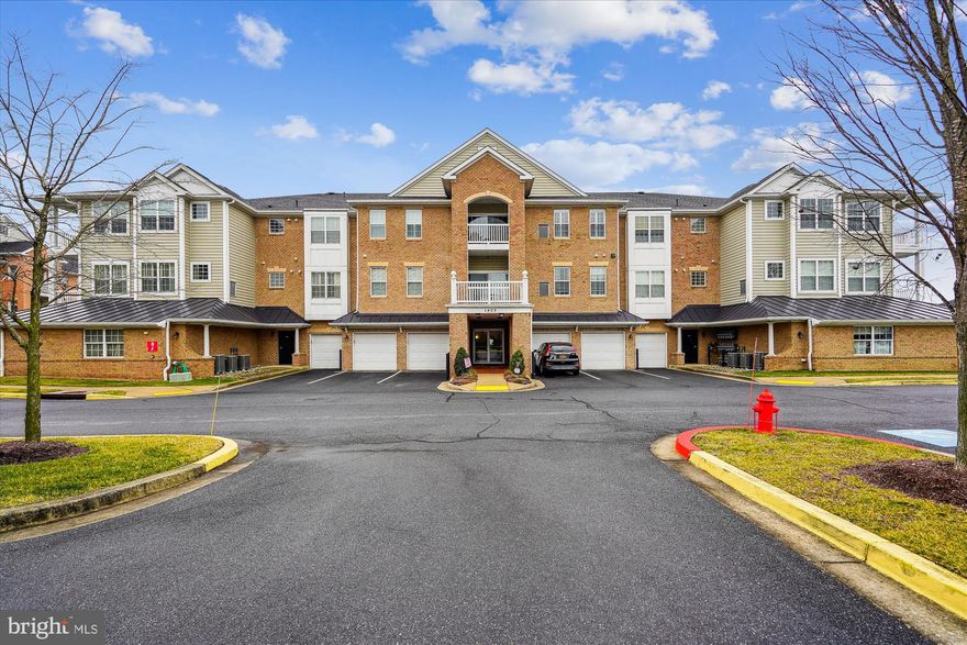 Come see this turn-key, low maintenance  2 bedroom, 2 bath main level condo unit located in the popular 55+ community at Carrolls Creek. The unit features an open concept living/dining combo, deluxe kitchen with SS appliances, gas stove, granite counters and maple cabinetry and outside patio. Primary bedroom features a walk-in closet, private bathroom with dual sink vanity, soaking tub and separate glass-enclosed shower. Bedroom #2 is generously sized and located on the opposite side of the unit along with a hall bathroom. A full size Washer/Dryer conveys with the unit. 2 assigned parking spaces are included and located to the right of the building. Carrolls Creek residents are able to enjoy an active lifestyle through a variety of community amenities. There is a large Clubhouse to relax and enjoy events/activities. It also includes a fitness center, outdoor swimming pool and a terrace with BBQ area. Community provides lots of landscaping, walking paths and benches. Ideally located just steps from shops, restaurants, banks, medical providers, movie theater complex, grocery stores and more in Waugh Chapel Shopping Center. You are near all major roads to Annapolis, Baltimore, Washington DC and BWI Airport. Home Warranty Included!