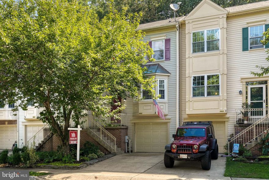 Price adjusted!  Highly sought after Crofton location!  This 1 car garage townhome has been meticulously maintained and is ready for move in.  The main level has farmhouse style scraped hardwood floors, a separate dining room with a step down to the oversized living room where you can cozy up to the fireplace.  The kitchen offers plenty of space for a table, plus tons of cabinet space and counter space for all your food prep needs.  The deck off of the living room has been freshly power washed and repainted and is just begging for an end of summer BBQ!  The primary bedroom suite has a private loft space which would make an ideal office or home gym space.  There is a deluxe primary bath, and the suite offers plenty of closet space.  The 2nd and 3rd bedrooms are a generous size and share a hall bath.  The lower level has the garage access, a powder room, brand new washer and dryer, family room or playroom space, and a slider to the rear patio.  Welcome home!!