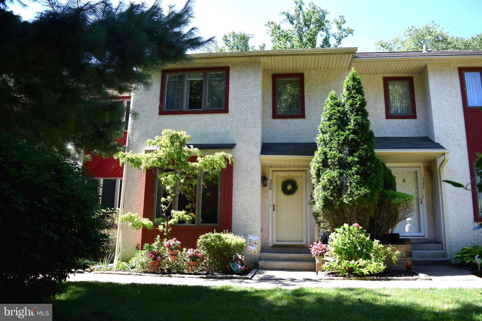 This is an amazing townhouse tucked back in the community with lots of privacy. From the moment you walk through the front door you will be impressed with the attention to detail starting with the gleaming hardwood floors through out the first floor. The living room is sun drenched by the newer large front window with deep window sill and has upgraded high hat lighting. Newer kitchen has white wood cabinets, hot plate inset into the counter, electric range, refrigerator (as is condition), new tile backsplash, ceiling fan and a breakfast room that give access through a newer slider to one of the largest decks in the community with privacy fencing. The family room has a corner gas fire place with mantel, chair rail & also has easy access to the deck. There is an updated powder room with beaded board, newer fixtures and freshly painted & a hall closet. The 2nd floor has a great size master bedroom with ceiling fan & newer updated master bath & walk-in closet. The 2nd bedroom also has a walk-in closet and a full bath with a tub and slider to balcony overlooking woods and all Mother Nature has to offer. There is a hall laundry closet, The 3rd floor serves a 3 bedroom with a bath and full walk-in storage. The location is convent to tons of shopping, public transportation, Routes 476 & 95 & 20 minuets to Philly international Airport.