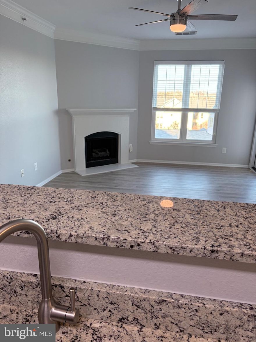 TOP FLOOR 1bd/1bth  CORNER UNIT, updated kitchen, granite countertops, custom cabinetry, and all new stainless steel appliances. A laundry closet with full size machines and an assigned COVERED GARAGE PARKING  space #18.
WALK to Wegmans, Metro, Mall... POOL and GYM on premises.