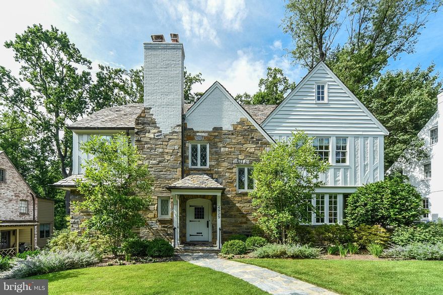 Best value in Spring Valley!  Built in 1932, this home has been extensively renovated yet maintains the integrity of the period. Chef's kitchen, new windows. updated baths, 4 finished levels, two sensational porches perfect for morning coffee and evening sunsets, 2 car garage, 12,000 sq. ft. lot backing to parkland. AND located on one of the prettiest streets in Spring Valley. OPEN 2/28 FROM 2-4