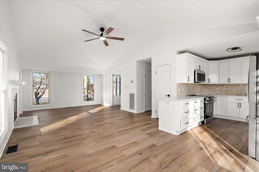 Welcome home to 302 Franklin Avenue, a beautifully updated home just a short walk from downtown Berlin. This 3-bedroom, 2-bathroom home has been renovated throughout, blending modern updates with the charm of an established neighborhood. The kitchen features brand new cabinetry, quartz countertops, a mosaic tile backsplash, stainless steel appliances, and a new sink, faucet, and garbage disposal. The main living area is bright and open, with vaulted ceilings and a fireplace with new stone installed at the hearth. Throughout the home you’ll find fresh paint, new lighting fixtures and ceiling fans, updated door hardware, new receptacle and switch covers, and new smoke detectors. Additional upgrades include new luxury vinyl plank flooring and carpet, updated bathroom vanities and fixtures, a custom wood accent wall in the office, and a washer and dryer. Outside, the rear deck has been structurally reinforced and resurfaced with TimberTech composite decking. The property also features landscaping improvements, an encapsulated crawlspace, and an automatic combo lock at the front door. Located about half a mile from downtown Berlin’s restaurants, shops, and town events, 302 Franklin Avenue offers updated, move-in ready living in one of the Eastern Shore’s most desirable towns.