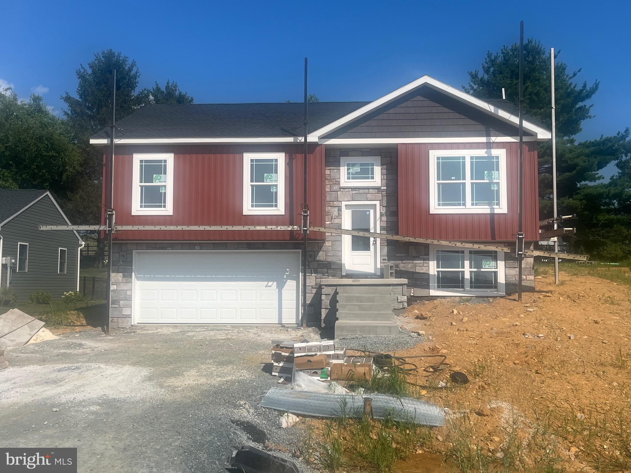 Welcome to Antietam Commons! Ashlynn Homes is offering 2 different split foyers. Lot 33 on Viking Ave, and Lot 11 Benning Ave. Houses are currently under construction, and are slated to be finished 8/31/25 . Prices start at $320,000. The renderings show the exterior colors, and the Interior photos are of a similar house. Each home features an open concept kitchen (island included), dining, and living room areas. All Kitchen appliances included. Granite Countertops, LVP flooring through out, except for the bedrooms, which will have carpet. The master bedroom features its own private bath, along with a closet. Full Poured concrete foundation. Central A/C and Electric Heatpump, and a 12x12 deck off the rear. The lower level family room/ bedroom area, and 1/2 bath will remain unfinished at the list price. Builder can finish it to match the rest of the property for an additional $20,000. Work can be completed prior to settlement, so you won't live in construction debris! Call today to find out more about this new construction single family home!
