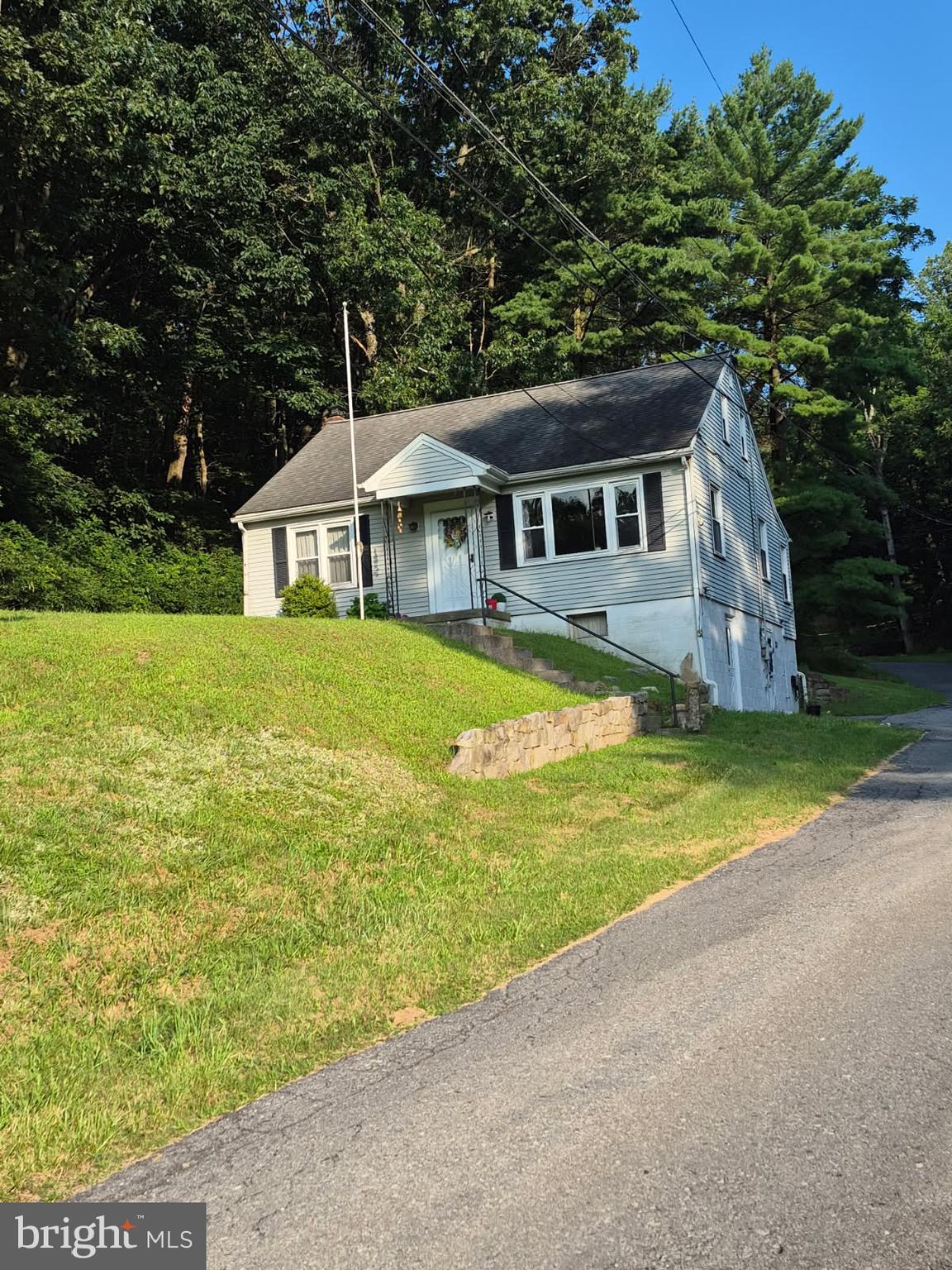 Charming Cape Cod-style home offering approx. 1,284 sq ft on a generous 0.73-acre lot. Features include an eat-in kitchen, beamed living room, large basement big enough for play room or workshop and a multi-use space off the main basement. The property is headlined by mechanical upgrades like newer HVAC (2020), vinyl replacement windows, hot water boiler in 2023 and an updated 200 amp electrical panel. A storage shed, beautiful view of Ledgerock Golf Course, a beer tap in the multi-use space in the basement and private setting, especially out back round out the appeal. Located in the Governor Mifflin School District this home blends solid upkeep with country-lot charm. Showings begin Wednesday September 17th. Interior photos coming.