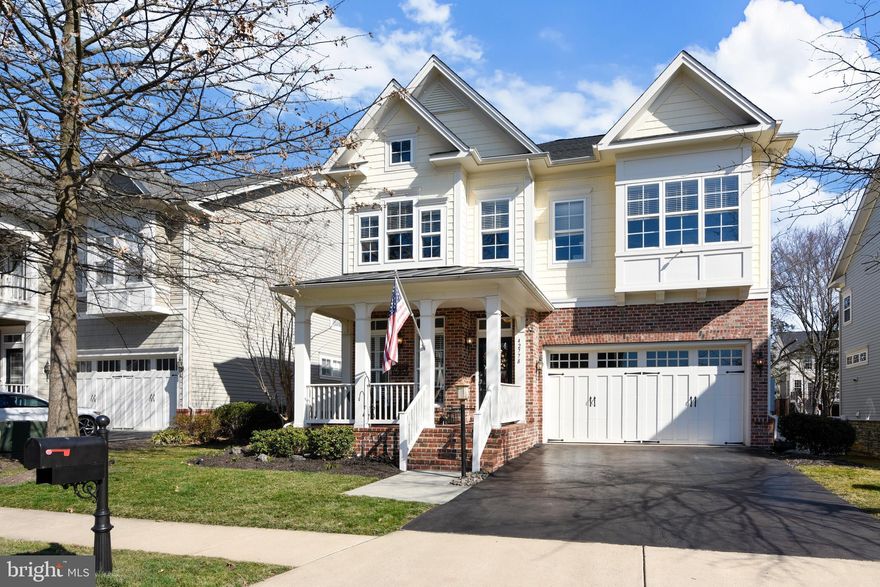 Spacious sparkling, Miller and Smith 1920's Collection Clara Bow Model with 4 foot extension.   Gorgeous home with over 5,000 finished square feet in an amazing Brambleton location.  Welcome to a home that is perfect in every detail. The home shows quality, graciousness, and superior design in every room. Inside and out this is a property you will be proud to call home.              In the rear of the home, you have a large open living space with a gourmet kitchen with a large island perfect for food prep, eating, or gathering. There is a lovely, sunny extended breakfast area and a light-filled family room with gas fireplace and a wall of windows overlooking the deck/trees in the private backyard.  Work from home in the oversize( 12x15) study/office.  The entire main level is flooded with natural light from the transom windows with shades/Plantation shutters.             The main and upper floors feature Hardwood flooring!         The upper level features 4 LARGE Bedrooms, including the Luxury Primary suite with a sitting room.& spa bath. There is also a spacious laundry room on this level. Please see the floor plan in Documents for detail on converting Laundry into 3rd upper bath.        The "English Basement"  lower level features a huge rec room with a wall of windows, a Gym/Media Room or 5th Office/playroom, full bath,2 large storage closets, plus additional unfinished storage area with (6) metal shelving units that convey. Brambleton HOA Features: Verizon FIOS- hoa package-, 4 Pool Complexes, 10+ miles of paved Trails, Sand Volleyball, Book Swap Boxes, Tot Lots, 15 Acre Park, Walk and enjoy all the Outstanding Brambleton Amenities: Movie Theater, Restaurants, Shopping, Fitness Center and State-Of-The-Art Library. Just a short walk to the Elementary School. New Middle and HS close by.                Take advantage of all of the Brambleton amenities: Parks and recreation, pools, sport courts/fields, library, adult and youth programs. Brambleton has 18 miles of paved trails, pools, parks and recreation areas, annual events, art and farmers markets. The Brambleton Town Center is minutes away: Dining, movies, coffee, groceries, doctors, health club. Enjoy the lifestyle so close to home. . Easy Access to NEW Silver Line Metro.