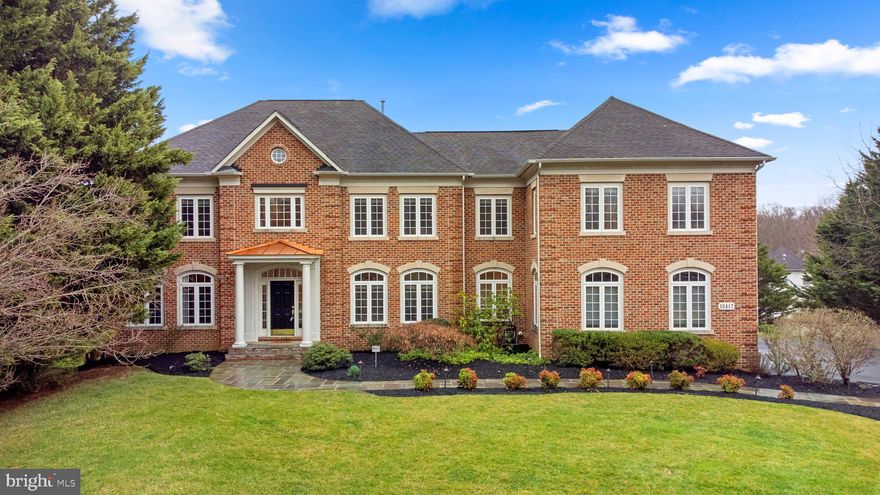 Immerse yourself in the perfect blend of modern elegance and timeless charm within this stunning residence, gracefully nestled on an expansive, nearly one-acre premium lot. Privately adorned with mature trees, specimen plantings, and a delightful flagstone patio, this home creates an oasis of tranquility on a secluded two-home cul-de-sac.

As you approach, a grand entrance marked by striking stone walls sets the tone for the majestic experience that awaits within. The property boasts a spacious backyard, inviting the possibility of a luxurious swimming pool for those seeking an elevated outdoor retreat.

This five-bedroom, four-and-a-half-bath haven, located in the esteemed Churchill High School district, spans three finished levels and features a 3-car side load garage. The interiors are graced with high ceilings, intricate custom molding, and built-in surround sound on two levels.

The journey begins in the dramatic two-story grand foyer, leading to the spectacular family room with a soaring two-story stone fireplace and a wall of windows framing picturesque views of the private backyard. Bathed in natural light, the family room seamlessly connects to the gourmet kitchen, boasting updated stainless appliances, an oversized center island, a walk-in pantry with custom built-ins, and a breakfast room with access to a custom deck surrounded by full windows.

Entertain with grace in the generously sized dining room, flowing effortlessly into the formal living room adorned with hardwood floors, extensive moldings, and custom blinds and draperies. A private office, complete with custom built-ins, wood shutters, and separate laundry and mudrooms with abundant storage, enhance the functionality of the main level.

Ascending to the upper level, discover an expansive primary suite featuring a tray ceiling, a separate sitting room, two large walk-in closets with custom shelving, a gas-burning fireplace, and a spa-inspired bath with dual vanities, a soaking tub, a separate shower, a private toilet room, and a linen closet. This level also hosts three additional bedrooms, each with walk-in closets, and two full baths.

Designed with impeccable taste and meticulous attention to detail, this home offers serene living at its finest, all while being just minutes away from parks, hiking trails, restaurants, and shopping. Welcome to a residence where modern luxury and traditional charm unite effortlessly.