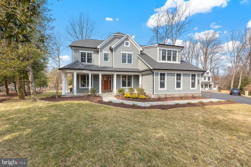 Price Reduction   Nestled on a private lot of nearly two-thirds of an acre, this meticulously maintained custom home offers 6,339 finished square feet of luxurious living space. Built by Mid-Atlantic Custom Builders, this exceptional six-bedroom, five-full-bath, and one-half-bath residence is located in the highly desirable Luxmanor Community. With a perfect blend of elegance, functionality, and modern design, this home presents an unparalleled opportunity for refined living.
The main level is an entertainer's dream, highlighted by a gourmet chef’s kitchen that boasts top-of-the-line appliances, including two Asko dishwashers, a Wolf 48-inch six-burner gas range with a chimney hood, and a Subzero 48-inch built-in refrigerator/freezer. The kitchen is completed with stunning 'Bexley' full-overlay cabinetry by Stuart Kitchens, designer quartz countertops, and a tile backsplash. An oversized island provides ample prep space and seating for casual dining. Adjacent to the kitchen is a walk-in pantry and a butler's pantry featuring a sink and beverage refrigerator, making this space both functional and beautiful.
The main level also includes a formal dining room, a grand foyer, and a study. The family room, off the kitchen, is a cozy gathering spot with a coffered ceiling and a gas fireplace. Step outside to the adjacent screened porch, where a stunning stone gas fireplace creates the perfect ambiance for relaxing or entertaining. A deck extends the outdoor living space, ideal for enjoying warm evenings. The family foyer/mudroom, with custom built-ins, offers a convenient place for storing backpacks, sports gear, and more, all located next to the three-car garage.
The upper level offers a private retreat with a luxurious primary suite. This serene space features two walk-in closets and a thoughtfully designed dressing area that conveniently connects to the laundry room. The spa-like primary bathroom is a sanctuary, with dual vanities, a freestanding tub, and a large shower with dual showerheads and a separate handheld. Three additional bedrooms, each with an ensuite bathroom, provide comfort and privacy for family members or guests. A loft area offers flexible space for a variety of uses, while an office/learning center creates the perfect environment for work or study.
The lower level continues to impress, with a spacious recreation room that features a wet bar and walk-up stairs leading to the backyard. An exercise/media room offers a dedicated space for fitness or entertainment, and an additional bedroom and full bath make this level perfect for guests or multi-generational living.
With its exquisite design and thoughtfully planned spaces, this home offers the perfect combination of luxury, comfort, and functionality. Located in one of the most sought-after communities, this is truly a rare opportunity to own a home of this caliber.