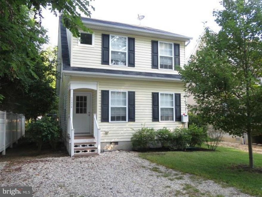 Cute, Cute, Cute ! Nestled on a quiet street, this cottage style home has 3 bedrooms, 2.5 baths, stainless appliances, 2 pantries, brushed nickel hardware, lighting & ceiling fans.Spacious open floor plan w/ laminate flooring throughout & lots of natural light.  There is additional storage in the pull down attic. Nice deck for entertaining. Priced to move quickly so bring those 1st time buyers!