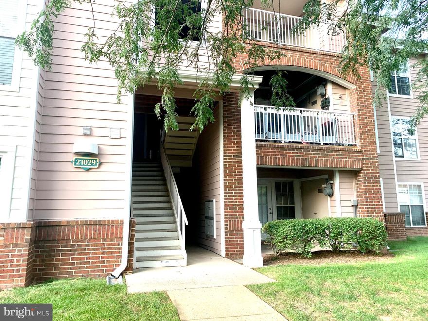 Lovely 2 bedroom, one bath condo in beautiful Ashburn Farm.   This unit has wood flooring, updated washer/dryer, spacious kitchen with stainless steel appliances, and storage room outside the unit.   Relax at your patio overlooking the pool.    Conveniently located within walking distance to shopping, dining and grocery.  Close to downtown Leesburg and Rt 7/15.   Available for immediate move-in.  Sorry, no pets.