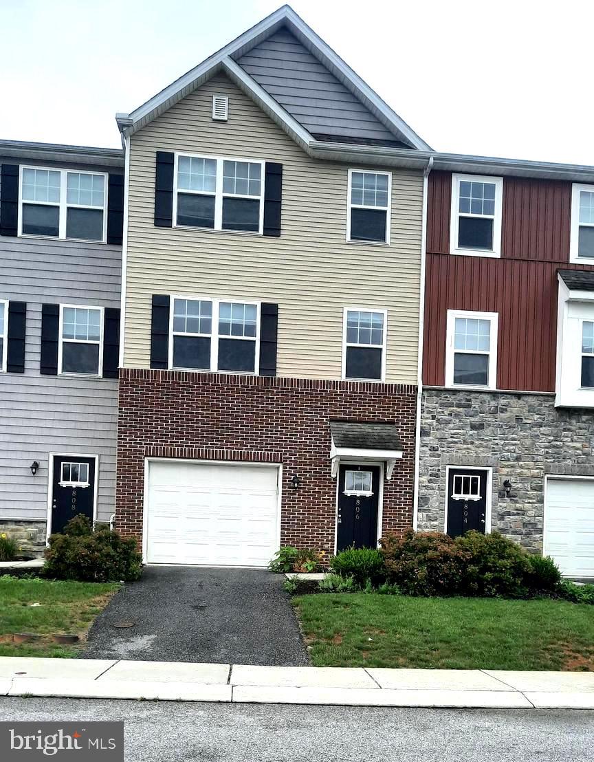 This beautiful two-bedroom townhome is now available in the very popular Admirals Quay development. This property was the previous model home and features many upgrades throughout, including crown molding, granite countertops, upgraded kitchen appliances, built in cabinets in the living room, finished first floor bonus room. The fireplace is for show only; it can only be used with an electric insert.
