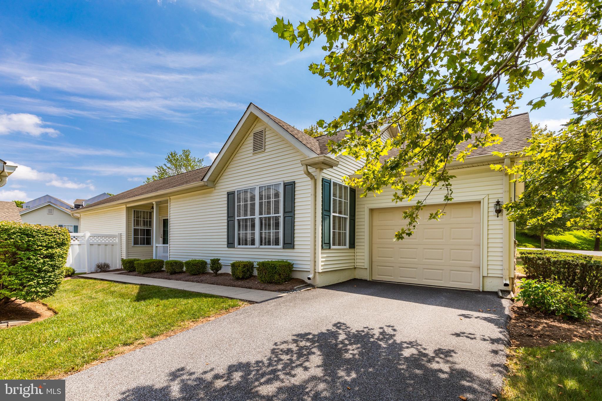 Lovely Georgetown model single home in pristine condition is ready for new owners! Neutral carpeting in the open living room dining areas, vinyl floor and oak cabinetry in the eat in kitchen with panty closet. Dining area has sliders and steps to a small yard area. Main bedroom has 2 closets-one is a walk in closet-and full bath with soaking tub and shower stall. There is a second bedroom, hall bath and laundry room with stationary tub and access to the 1 car garage. There is an unfinished basement that offers plenty of storage. This home was extremely well kept and is neat and clean. The clubhouse offers plenty of activity-indoor and outdoor pools, fitness area, library, billiards and game room, showers and saunas, walking trail, tennis, pickleball bocce and shuffleboard courts