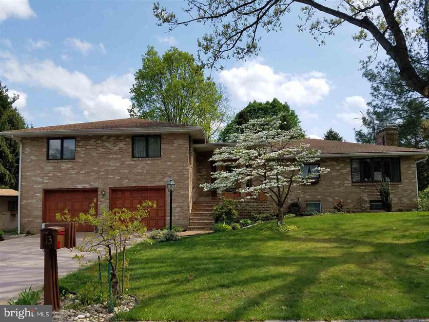 A "Delight in-the-Round"! Split level w/circular entrance foyer & semi-circular staircase is the envy of the neighborhood. Built & lovingly maintained by one owner. Home features updated Ikea kitchen w/corian countertops, formal DR, & LR  & cozy FR w/fireplace both w/access to the large rear patio/deck. MBR features a large Ikea closet & bathroom. A finished basement adds living space, a sauna, & a workshop for the hobby enthusiast. Updated wood floors thru-out. Yard w/pond & gardens. Lots of storage!