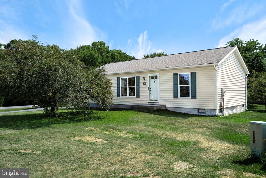 Delightfully Charming One-Level Home in Martinsburg! Nestled on a 0.27-acre corner lot in the community of Nadenbousch Heights, this 3BR/2BA ranch sits on a level lawn with mature trees. Venture to the backyard to find an entertainment-ready outdoor space with a  covered deck and a gravel surround. Recent upgrades include a roof replacement (2019) new HVAC (2018) new hot water heater (2022) and upgraded primary bath (2019). Conveniently  located near shopping, P&G, I-81, schools, and dining, and more! Come See Now!