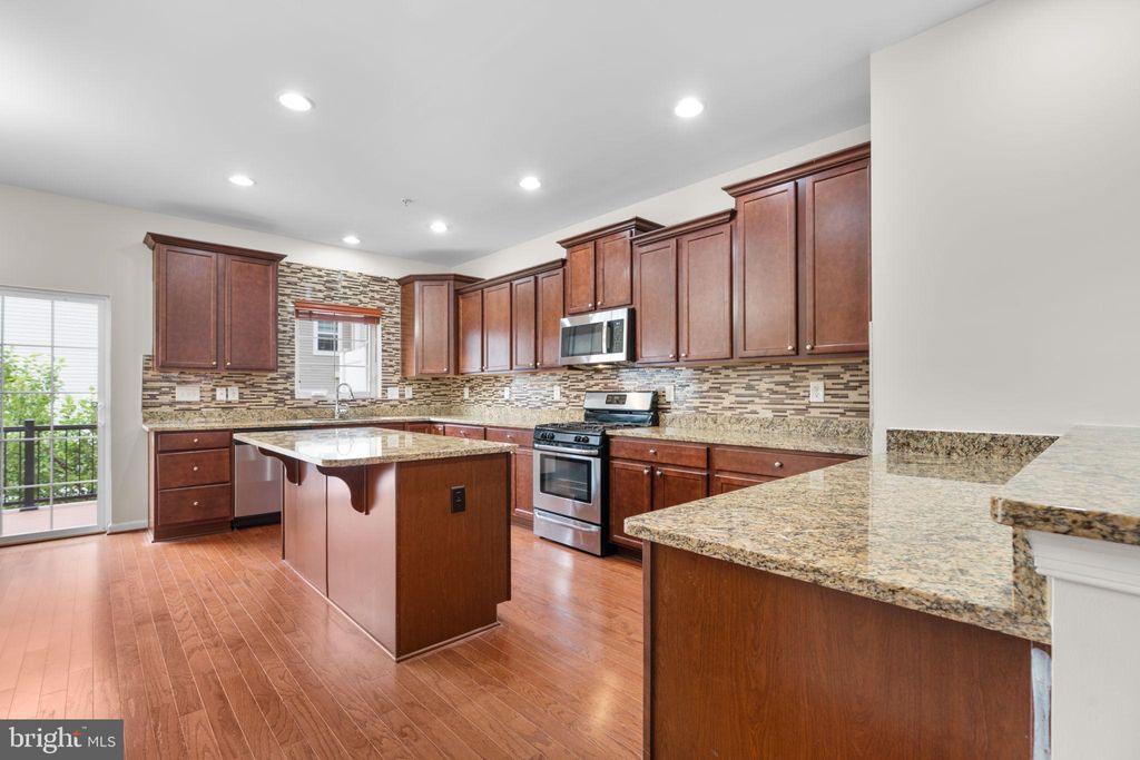 Photo of 7997 Alchemy Way, ELKRIDGE, MD 21075 (MLS # MDHW2061212)