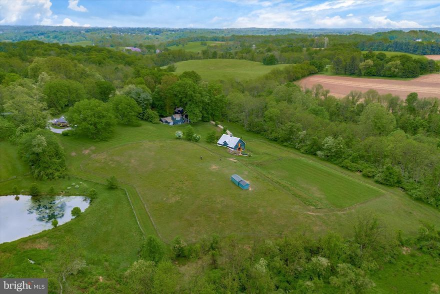 Welcome to Lucky Horse Farm!  Nestled in the picturesque West Bradford Township and within the renowned Downingtown School District, this stunning Gentleman's Horse Farm spans 7.5 acres across two parcels. A haven for horse enthusiasts, this property boasts a rich history. The main residence, a beautiful 3-bedroom, two-bathroom home, originally built in the late 1700s in York, was meticulously relocated to its current location in 1974, preserving its timeless charm and character with modern amenities. Enjoy the ultimate equestrian lifestyle with a well-equipped barn featuring five stalls, two spacious paddocks, and a lush grass riding ring, ensuring optimal comfort and convenience for both horses and riders. Unleash your creativity in the charming art studio, offering a serene space to indulge in artistic pursuits amidst the tranquility of the countryside. The property includes a one-bedroom in-law/rental suite, providing flexible living arrangements or rental income potential.  Situated across the street from Stroud Preserve, residents have direct access to two scenic horse trails, allowing for idyllic rides amidst stunning natural landscapes. Within walking distance of the historic Marshalton Inn and Four Dogs Tavern, residents can indulge in fine dining and entertainment options. Additionally, the property is only minutes away from the vibrant town of West Chester, offering a plethora of shopping, dining, and cultural attractions.  Embrace the serene beauty and unparalleled amenities of this remarkable property, where historic charm seamlessly blends with modern comfort. Whether you're a passionate equestrian seeking the perfect retreat or a discerning homeowner craving a tranquil lifestyle, this one-of-a-kind property offers an unmatched opportunity. Schedule your private viewing today and embark on a journey of luxury, tranquility, and equestrian excellence.