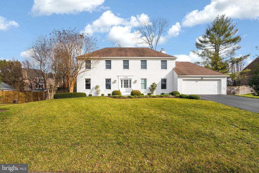 Remarkable brick Colonial in sought after Lynwood. Sunlight fills this beautiful 4 bedroom 4.5 bath home with hardwood floors throughout. The foyer opens to the formal Living and Dining Room with sophisticated millwork. Renovated Kitchen has large island, top-of-the-line appliances including warming drawer and opens to the cozy Family Room with fireplace and bay window seating. To complete the Main Level is the Study with built in shelves and Mud Room. Upper Level boasts the Master Bedroom with two walk-in closets and sumptuous Bath as well as three spacious Bedrooms and two full Baths. In the Recreation Room you ll find a Fitness Room, full Bath, Wet Bar and tons of storage space. Exterior features and expansive screened in porch, Patio and attached 2 car Garage