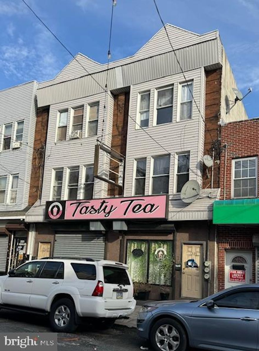 A joint restaurant/tea house on the first floor and 4 residential apartments on the upstairs.  In the past few years, 7th street beomes very busy and booming. Come to check it. You can also buy the two two story building 2227 and 2229  S 7th St with favorable price.