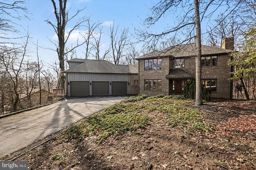 Located on a spacious wooded lot in one of the area’s most sought-after communities, Mountaindale.  Bring your vision inside, a few thoughtful updates could easily elevate this home to standout status. Mature trees surround the property, creating a peaceful backdrop for everyday living, outdoor entertaining, and relaxing by the heated in-ground pool w/new liner('24). Whether enjoying morning coffee on the deck or in the 4 season sunroom with lots of windows or unwinding in the screened porch, the beauty of the outdoors is always within view.

In addition to lots of wonderful windows, the home features generous room sizes and a flexible floor plan designed for both comfortable living and entertaining. The living room with wood fireplace and formal dining room with hardwood floors provide inviting gathering spaces. The kitchen offers a dining area, Pergo flooring, and convenient pantry access in the adjoining laundry room. A first-floor bedroom with full bath adds versatility for guests or multigenerational living, while the sunroom with vaulted ceiling, electric fireplace, and tile floor provides a bright, year-round retreat.  Open both sets of double doors onto the deck for great traffic flow when hosting gatherings.

Upstairs, the spacious primary suite includes a walk-in closet and private bath with spa tub. Two additional bedrooms and a full bath complete the second level.

The finished lower level significantly expands the home’s living space, featuring a family room with 2nd wood fireplace, a large great room, exercise room, and access to the screened porch.  Ideal for recreation, hobbies and more. 

An oversized 3-car garage includes a second-floor office with built-ins, vaulted ceiling, skylight, ceiling fans, and carpet—perfect for working from home or creative pursuits. Additional features include a security system, central vacuum, and wired sound system. Conveniently located near shopping, dining, I-81, and Route 322, with an easy commute to Harrisburg and the West Shore.