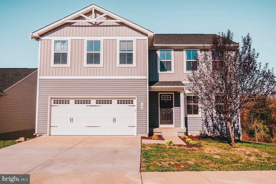 Welcome home! Spacious craftsman style home in Villages at Middletown. The main level with large kitchen, dining and living room area is open and light-filled, making it perfect for entertaining. Walk out onto the back deck to enjoy the views with your morning coffee (or dine outside, there's plenty of room!)The upper level of this home boasts 5 bedrooms (or potentially use one as an office space), 2.5 baths, and large laundry room.  Need more space? The basement is ready for your vision! Finish your way , it already has a rough in for a full bath! Walk out basement leads to beautiful patio space and large fully fenced backyard (corner lot backs to green space and tree line). ***ASK ABOUT THE VA assumable mortgage under 3%***