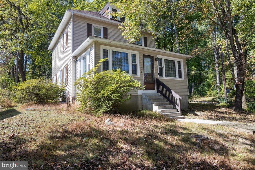 With a new price improvement and motivated sellers, this beautifully maintained 1907 Colonial is now ready to sell. Steps from the Delaware River, minutes to major highways, and featuring a rare first-floor primary suite, this home delivers charm, convenience, and comfort in one timeless package.

Set on a serene corner lot, the property blends historic character with thoughtful updates, creating a peaceful retreat ideal for both daily living and weekend relaxation. Inside, the first-floor primary suite offers privacy and ease of access, complemented by newer flooring and abundant natural light.

The inviting living and dining areas showcase high ceilings, warm finishes, and period details that speak to the home’s heritage, while updated mechanicals and a newer boiler provide modern efficiency. The eat-in kitchen with rustic beamed ceilings flows effortlessly into a cozy four-season family room—perfect for morning coffee or evening unwinding.

Upstairs, three additional bedrooms and a full bath provide flexibility for family, guests, or a home office. An oversized one-car garage and walk-up attic offer generous storage and future potential.

Enjoy life just steps from scenic trails, the river, and outdoor recreation—while staying within an easy commute to NJ and NYC. With its enhanced pricing and standout features, this home is positioned to sell quickly. Schedule your private tour today.