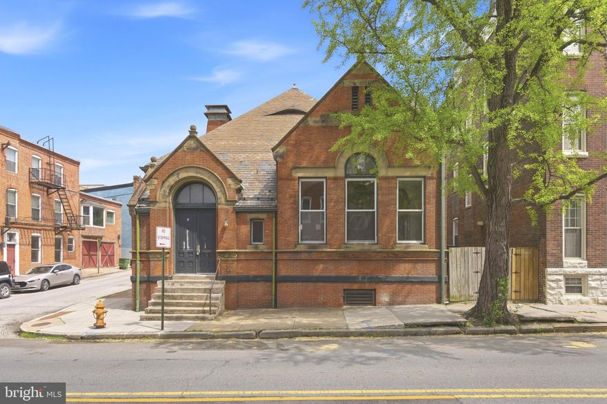 Prominently positioned along Light Street in the heart of Federal Hill, 1401 Light St represents a rare opportunity to acquire a historic, well-located commercial asset with flexible zoning and strong long-term usability. Originally constructed as one of the first branches of the Enoch Pratt Free Library in Baltimore, the property carries architectural significance and a level of prominence that is increasingly difficult to replicate in today’s market. Zoned OR-1 (Office Residential), the building supports a wide range of professional and institutional uses, including professional offices or headquarters, medical or wellness services, residential care facilities (ALF), child or adult day care, and live/work configurations. 
The structure also offers the potential for residential or mixed-use conversion, subject to zoning approval. The building features a functional layout with high ceilings, substantial natural light, and solid construction, including the possibility of adding a second floor within the existing structure to increase the usable square footage. Its scale and character provide a strong foundation for a user seeking both presence and practicality. Please see the attached rendering photos for examples of various use-case options.
The location benefits from consistent foot traffic, immediate access to downtown Baltimore, and proximity to dense residential and retail amenities. Federal Hill remains one of the city’s most stable and desirable submarkets, supporting both business operations and long-term value retention. This is a straightforward opportunity for an investor, developer, or owner-user seeking an adaptable building with historical character and enduring utility.