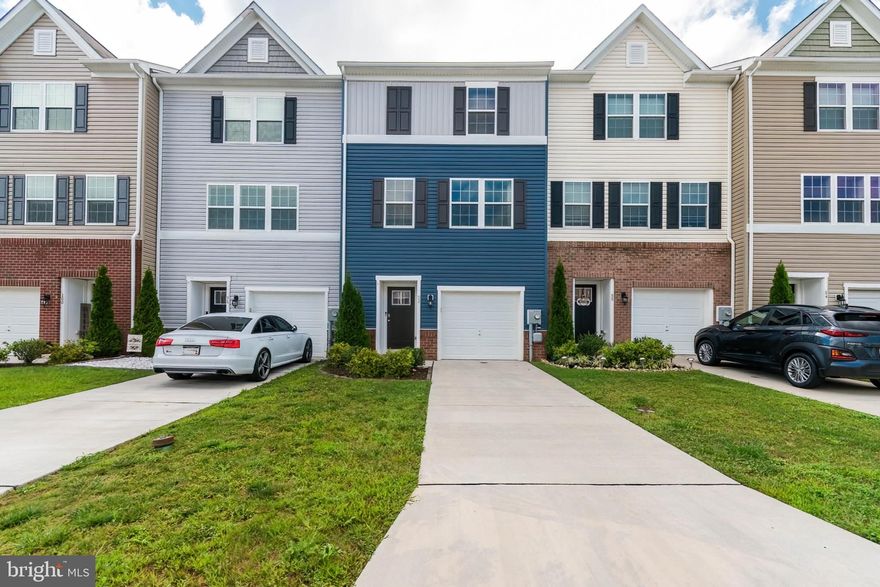 STUNNING 3-finished level townhome in Spring Mills! This home is immaculate! 1st floor includes a walkout family room with a half bath and 1-car garage. The main floor consists of an open concept design to include an upgraded kitchen with granite countertops, an oversized island, stainless steel appliances, and a walk-in pantry. One side of the kitchen opens up to a lovely deck; the other end opens to a dining area and living room with a cozy fireplace and beautiful built-in cabinetry and shelving.  All luxury flooring is on this level. Upstairs is where the bedrooms and 2 full baths are located, along with the included washer and dryer.  All of this in a great neighborhood, located close to new schools, shopping and medical offices.