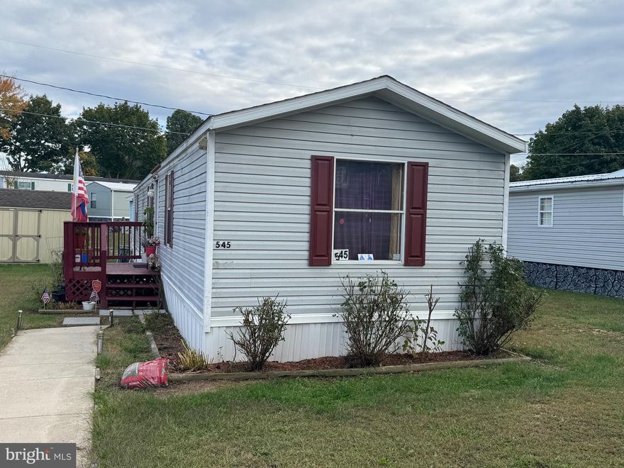 Come look at this nice home, 980 SQ FT. home. 3 Bedrooms, 2 full baths, living room, eat in kitchen.  This home has a storage shed, and 2 car pad for parking. There is lot rent, so you will have to get park approval.