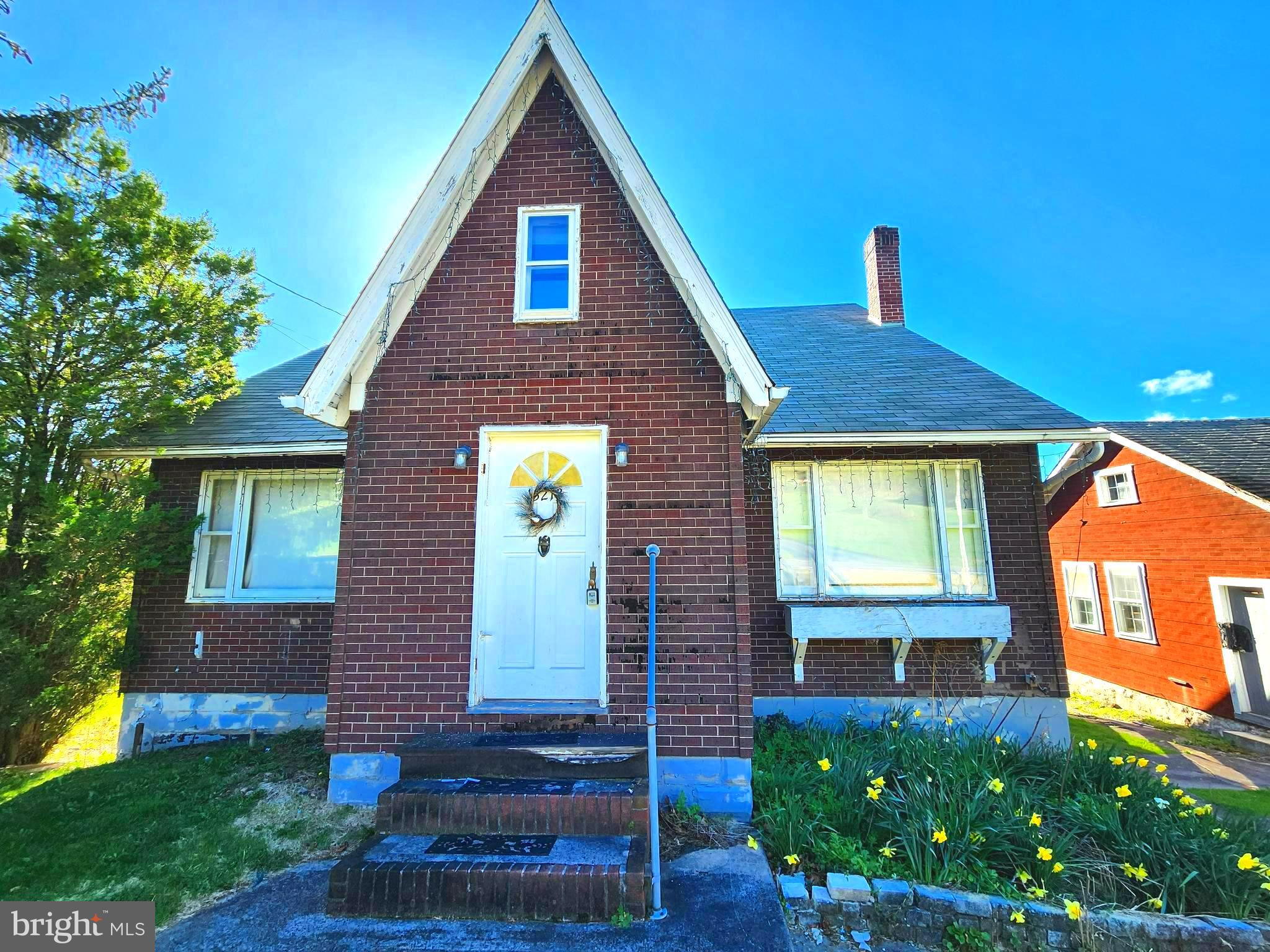 This single-family home offers endless possibilities! Situated just off Rt. 936, it features 4 bedrooms and 1.5 baths. The original woodwork and flooring add character throughout. A spacious kitchen and separate dining area provide ample space for family gatherings. Relax on the enclosed side screened porch while enjoying your morning coffee or tea. With an approximately .96 acre lot and a detached two-car garage, there's plenty of room to roam. The property is being sold strictly AS-IS, with evidence of moisture in the basement. Heating is fueled by propane, with the tank leased. Despite these considerations, this home holds great potential. Call today to schedule a tour and explore the possibilities!